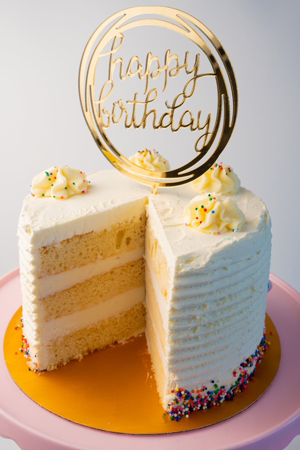 Sliced gelato cake showing gelato and cake layers