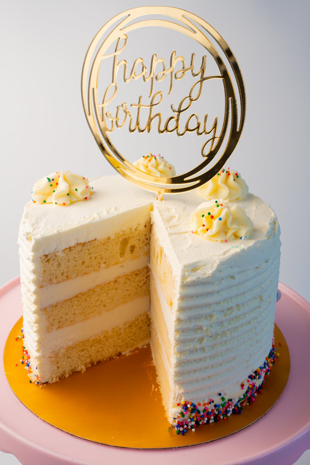 Sliced gelato cake showing gelato and cake layers