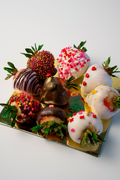 Hand-decorated chocolate-covered strawberries in dark, white and pink chocolate from The Gelato Lab in Round Rock